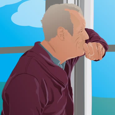 Man looking out of a window