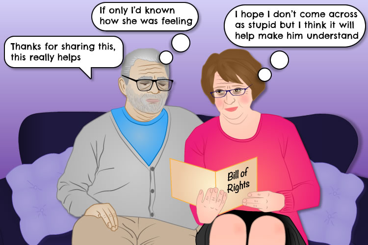 Couple seated on the sofa looking at a bill of rights